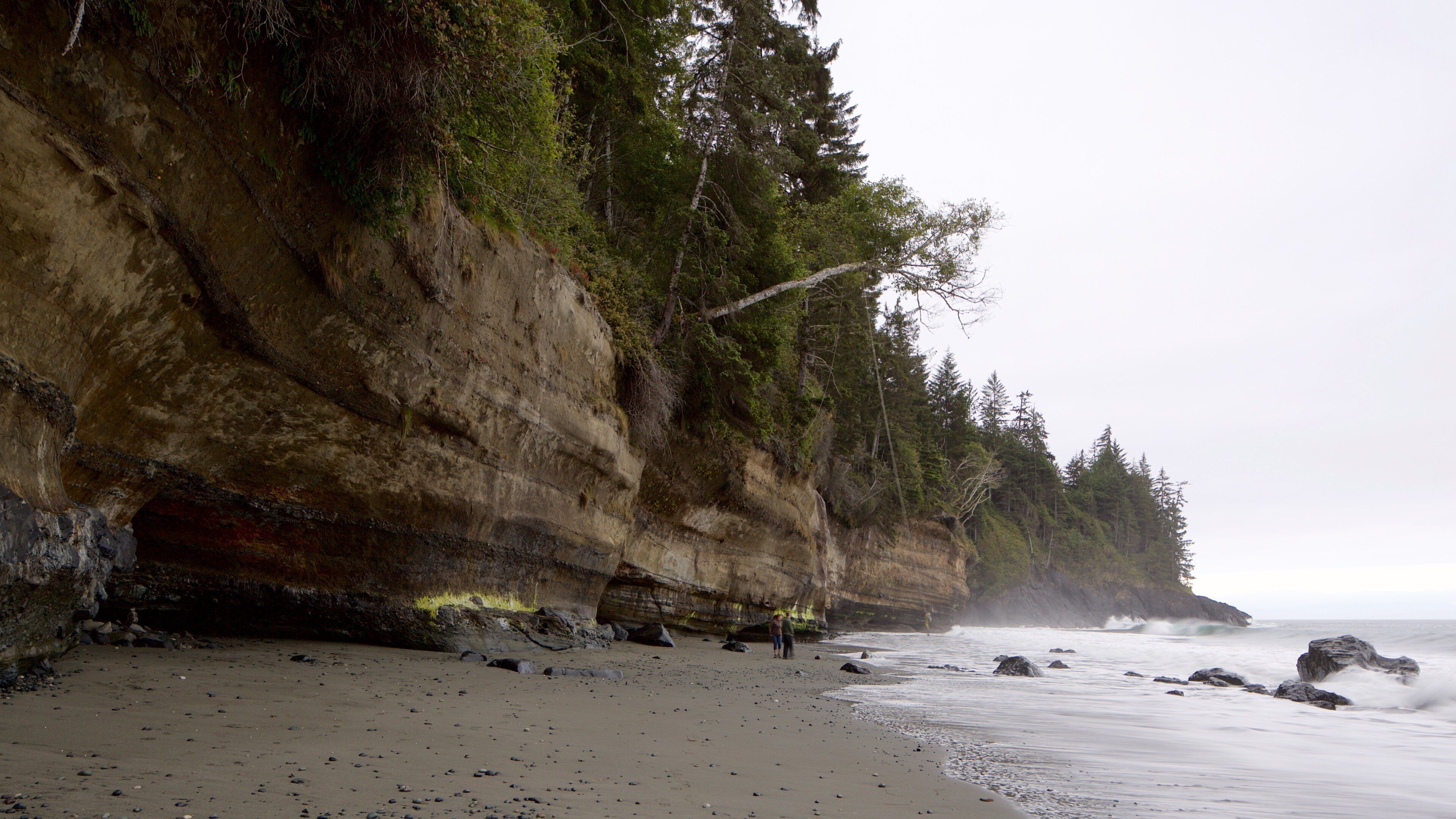 Mystic Beach showing a sandy beach, general coastal views and rocky coastline