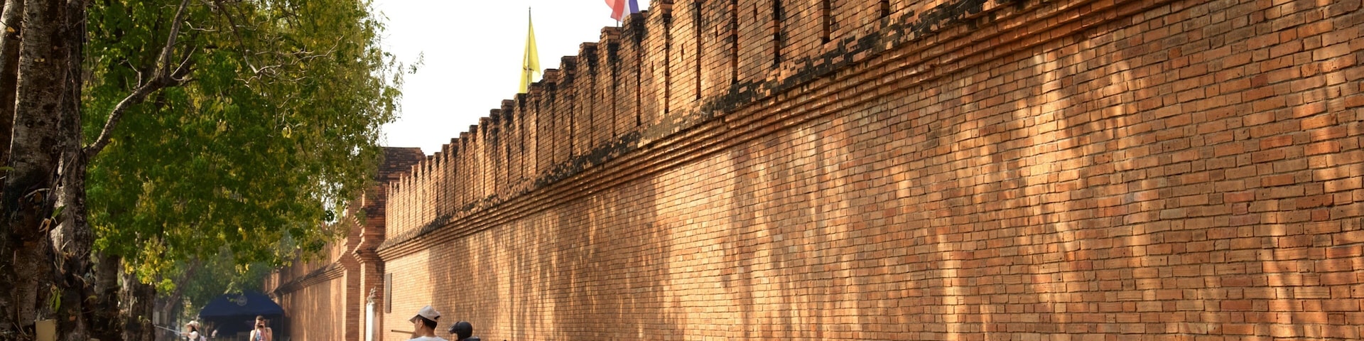 Chiang Mai which includes street scenes and heritage elements as well as a small group of people