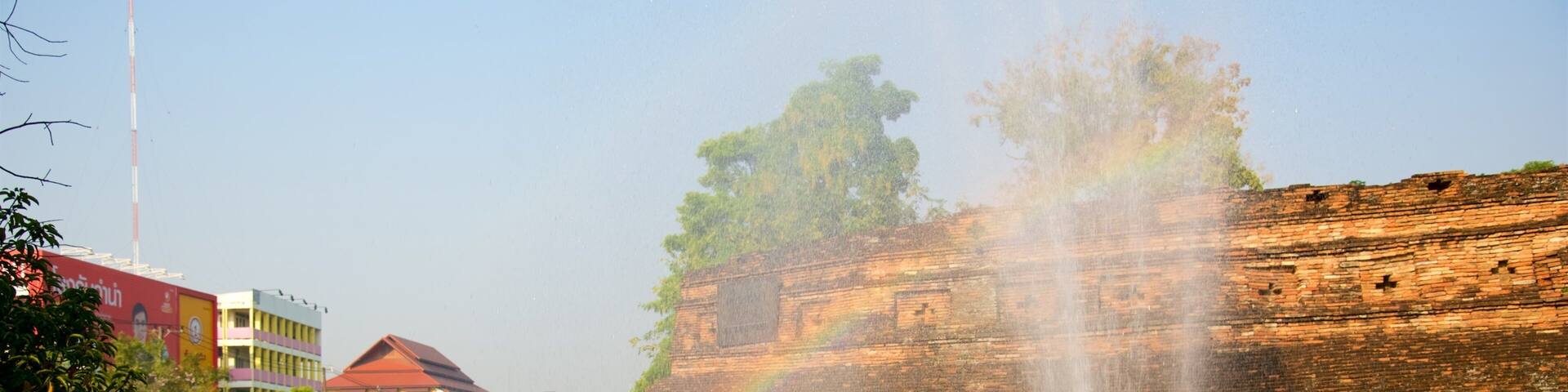 North Thailand showing a ruin, a fountain and a pond