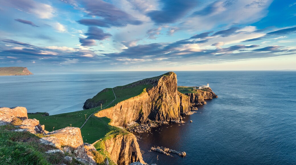 Colorful Sunset Clouds over Neist Point Lighthouse, Popular Loca