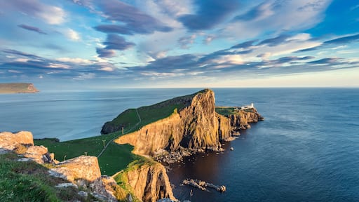 Colorful Sunset Clouds over Neist Point Lighthouse, Popular Loca