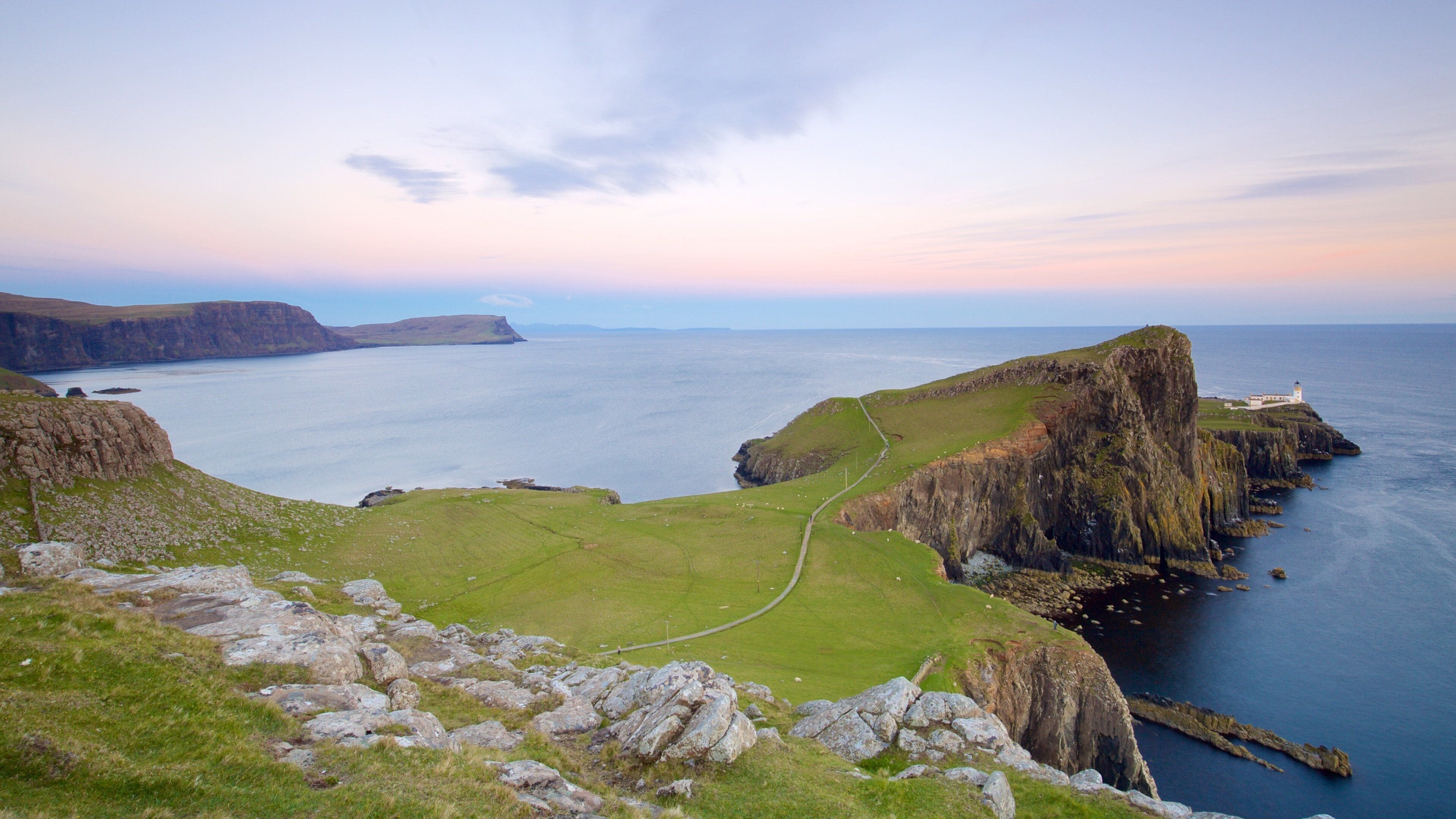 Neist Point Lighthouse showing rugged coastline and tranquil scenes