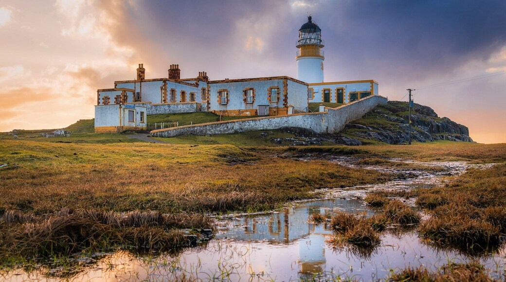 The weather was bit misleading here on the Isle of Skye in Scotland. When I left my house at Skeabost Bridge, it was raining, and the sky was grey, but the sign of light coming from the Neist Point direction did bring some hope to this photography journey. I was very windy around the Neist Point lighthouse, but beautiful at the same time.