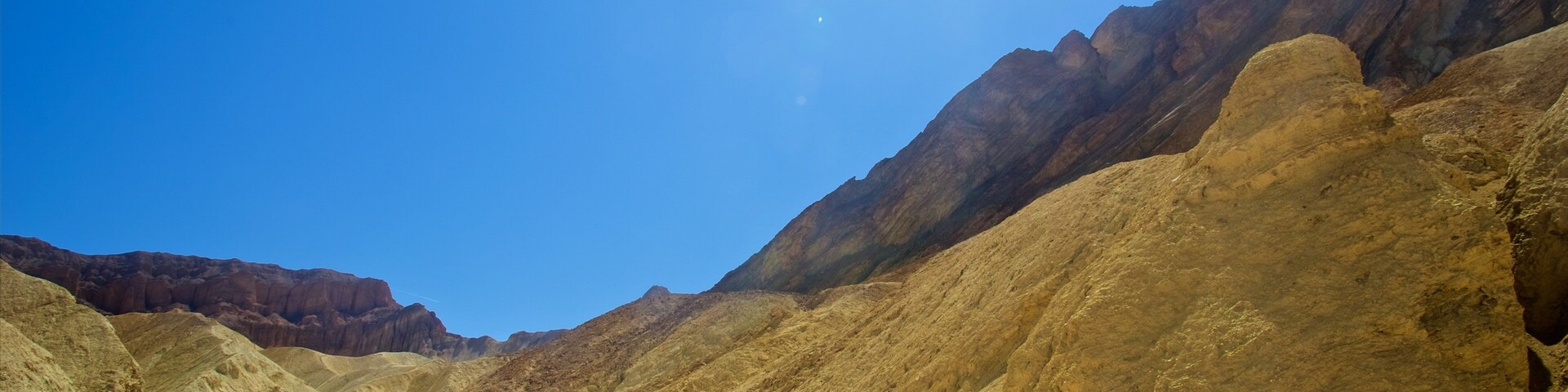 Vale da Morte mostrando cenas tranquilas, paisagens do deserto e escalada ou caminhada