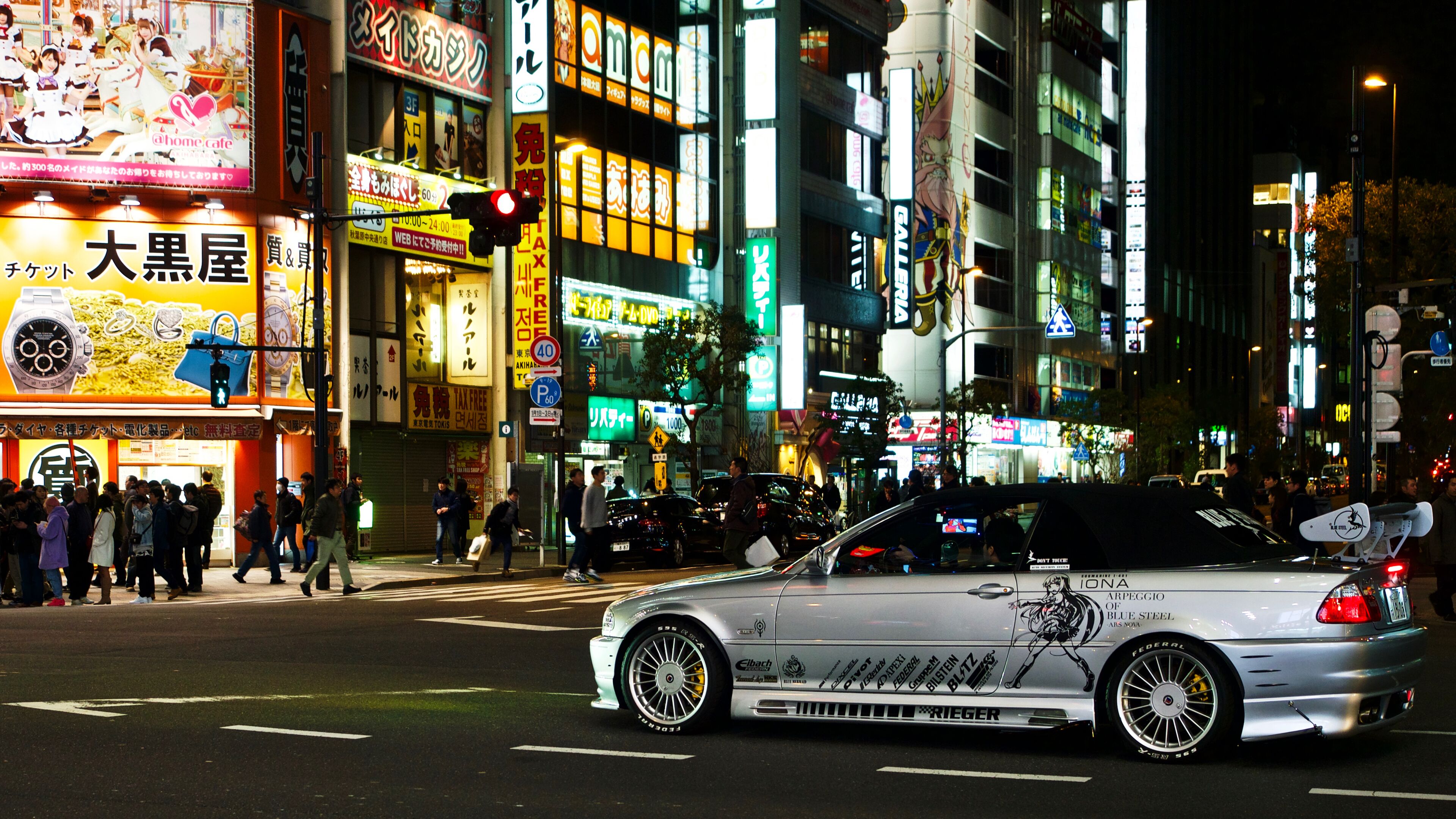 Flashy cars are part of the nightlife in Akihabara, Tokyo, Japan.
