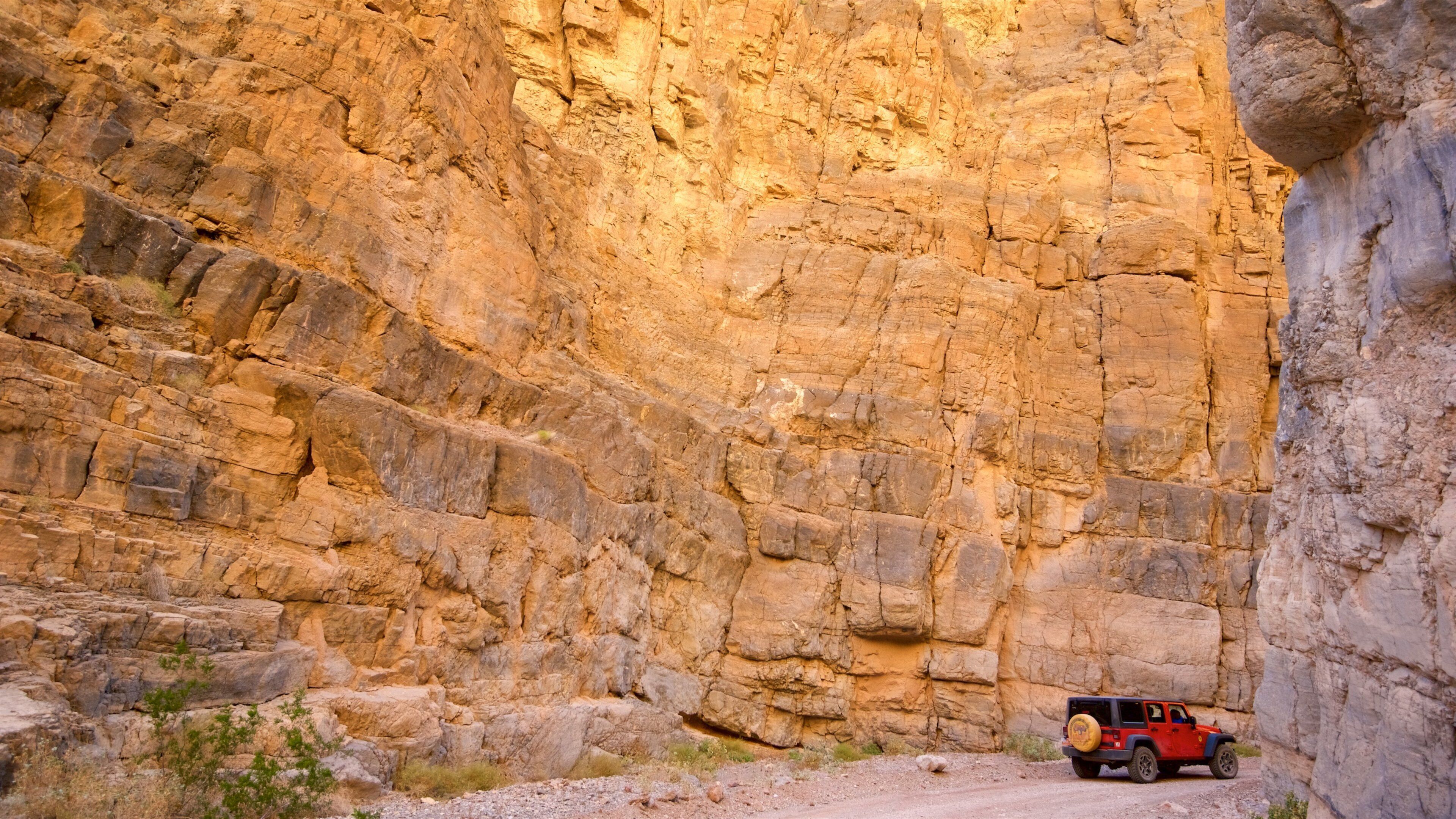 Titus Canyon showing a gorge or canyon and 4 wheel driving