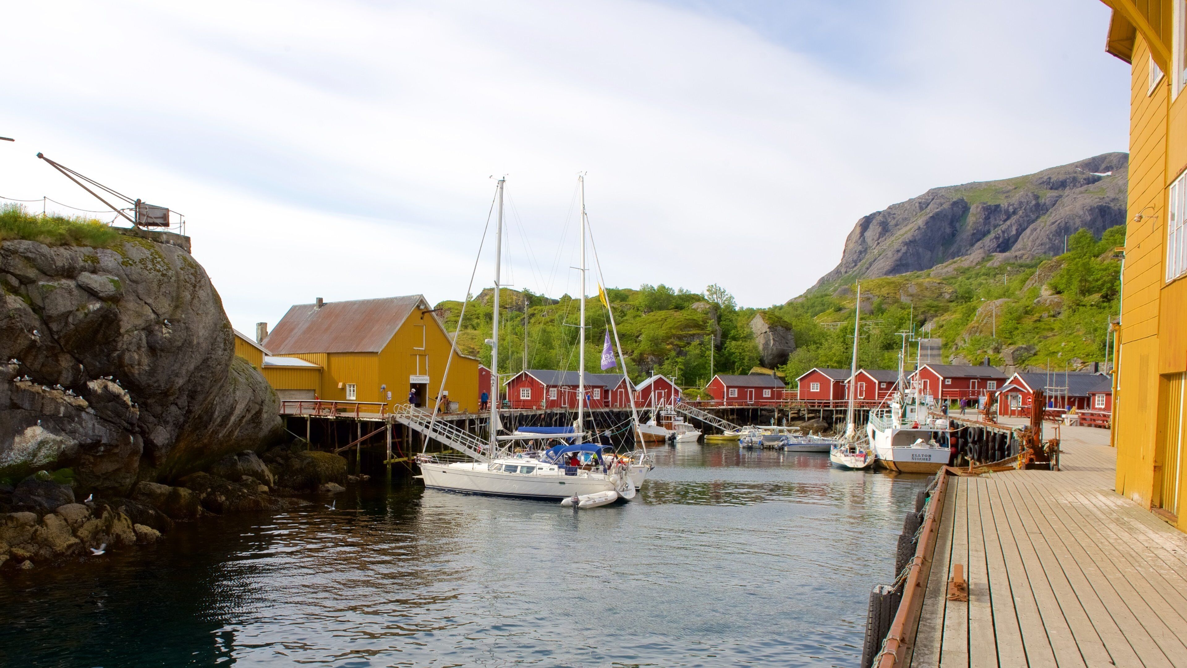 Leknes featuring a river or creek and a small town or village