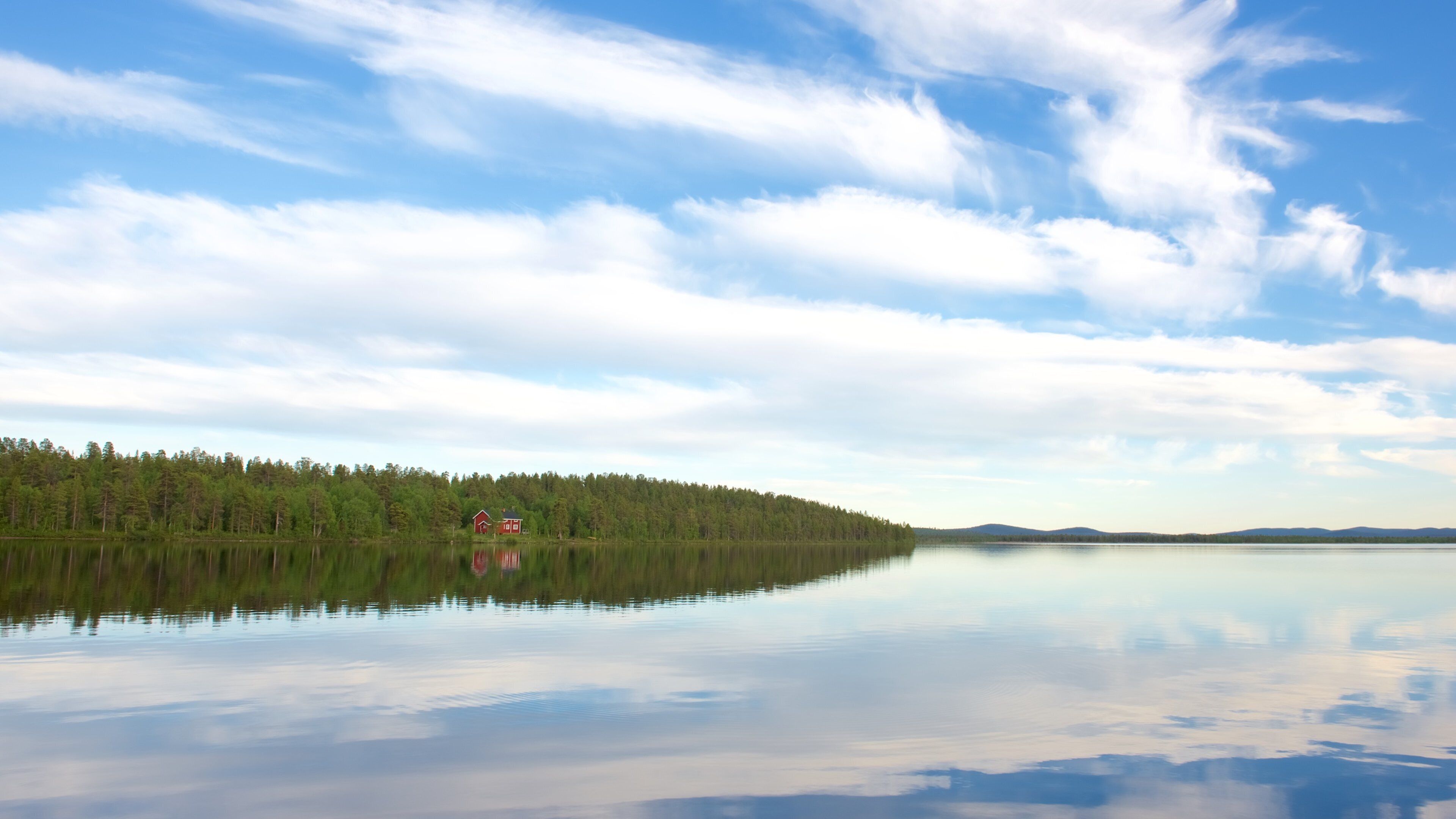 Inari which includes landscape views and a lake or waterhole