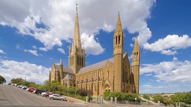 A large church with multiple spires and a clock tower.