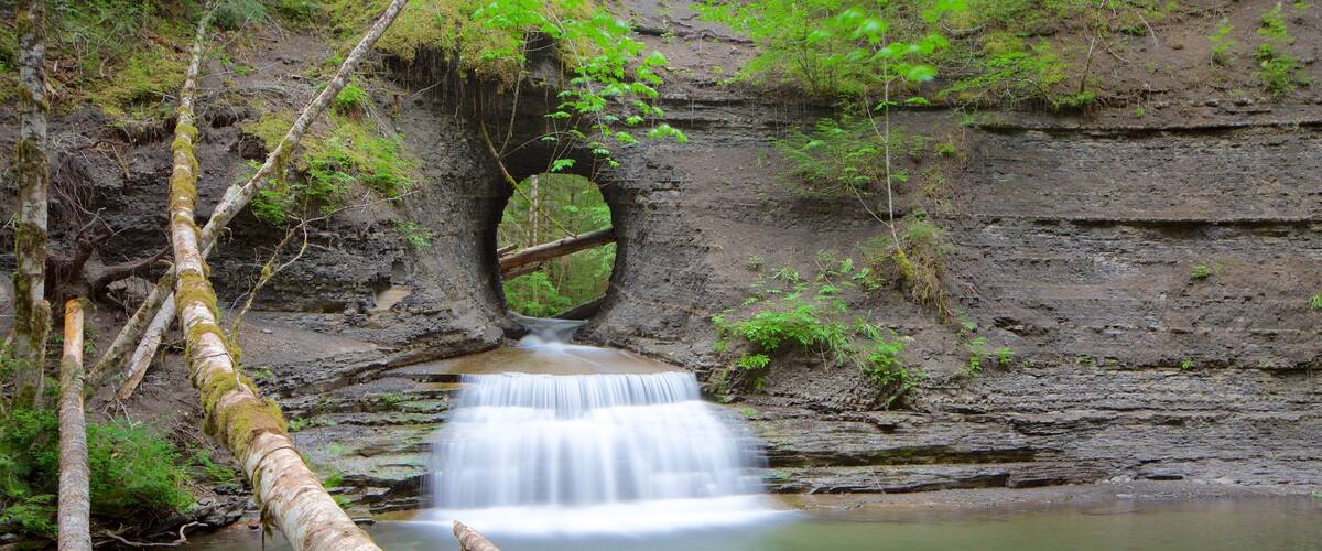 Hole In The Wall featuring a lake or waterhole and a river or creek