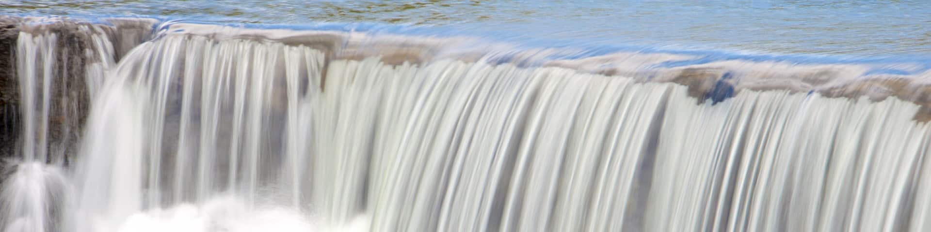 Chute de la Madeleine Lookout which includes a waterfall