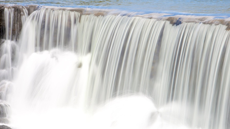 Chute de la Madeleine Lookout which includes a waterfall