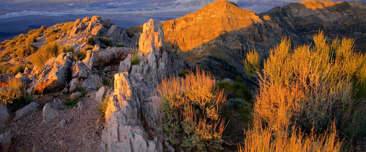Death Valley which includes a sunset, landscape views and tranquil scenes