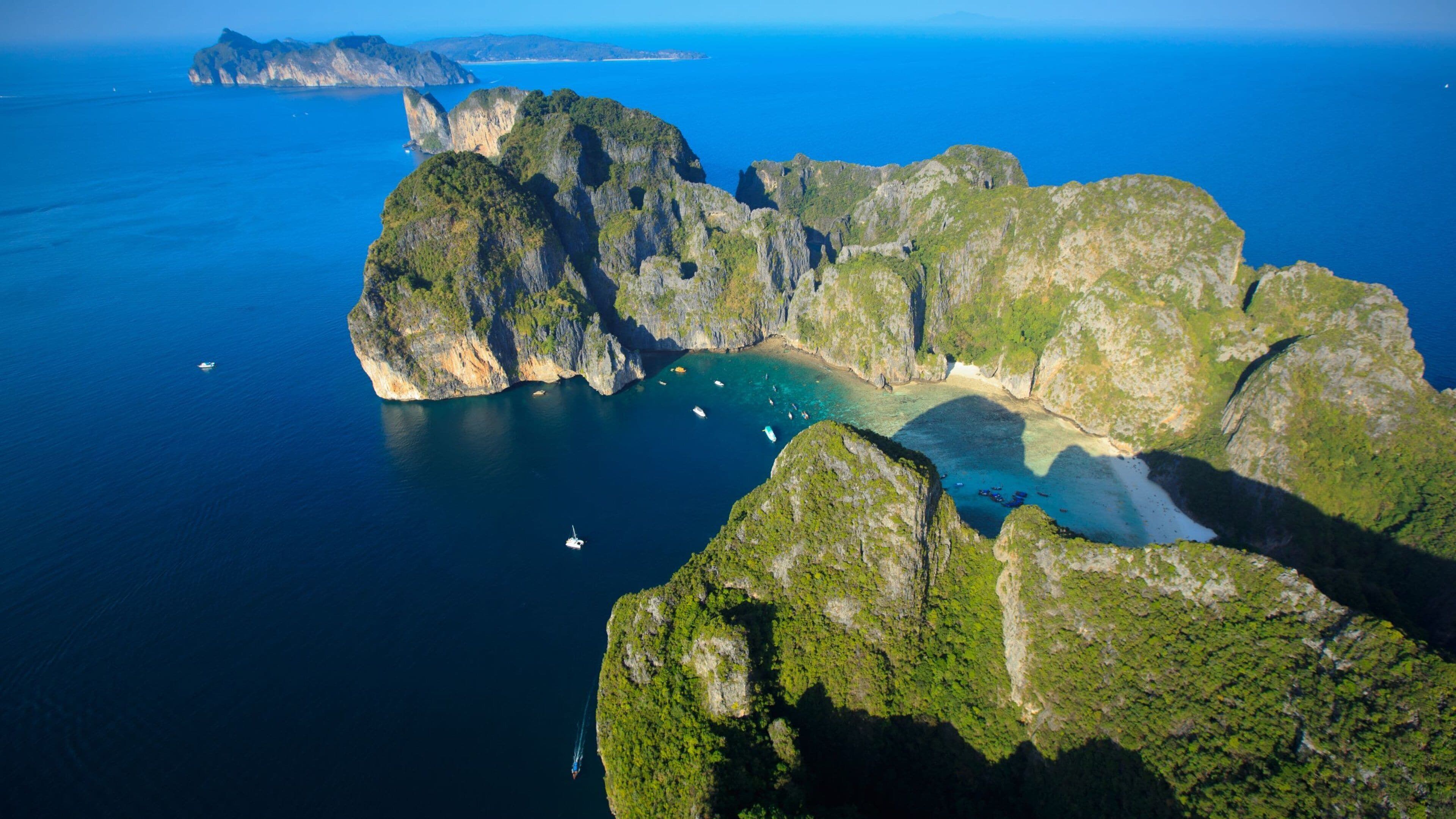 Phi Phi Islands which includes general coastal views, rugged coastline and landscape views