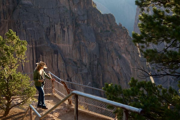 Montrose featuring views and a gorge or canyon as well as an individual female