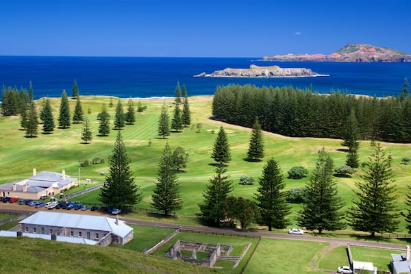 Norfolk Island which includes tranquil scenes, general coastal views and a small town or village