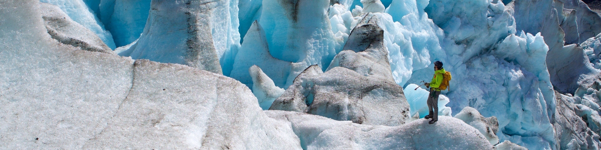 Godwin Glacier showing climbing and snow as well as an individual male