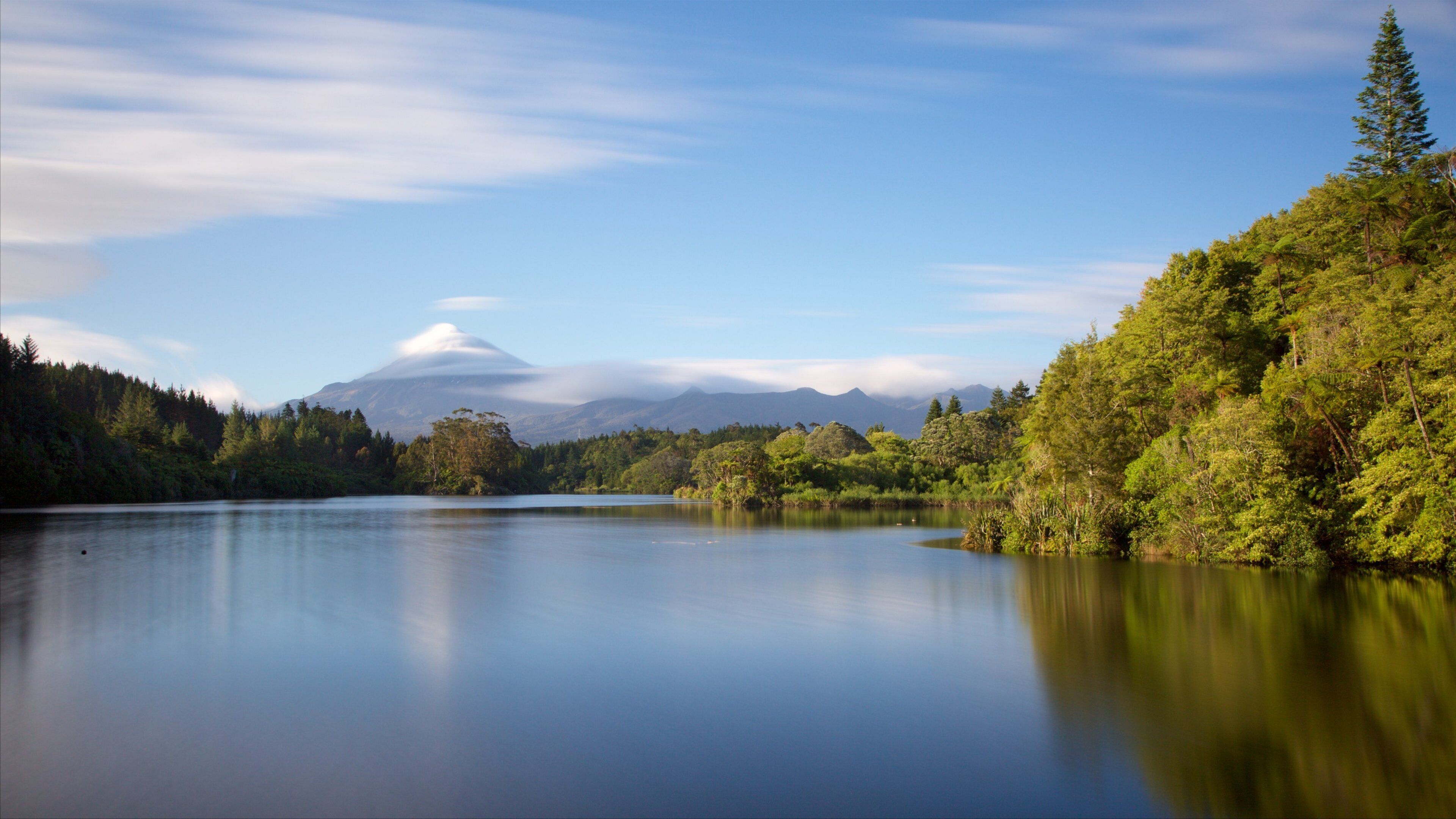 Lake Mangamahoe showing forest scenes, mountains and a lake or waterhole