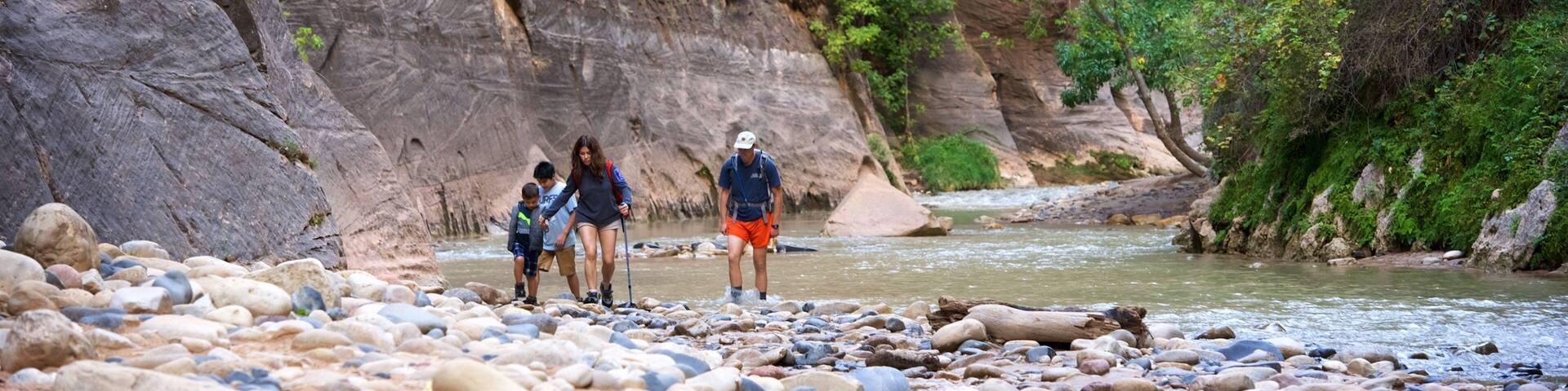 Zion National Park which includes hiking or walking, tranquil scenes and a river or creek