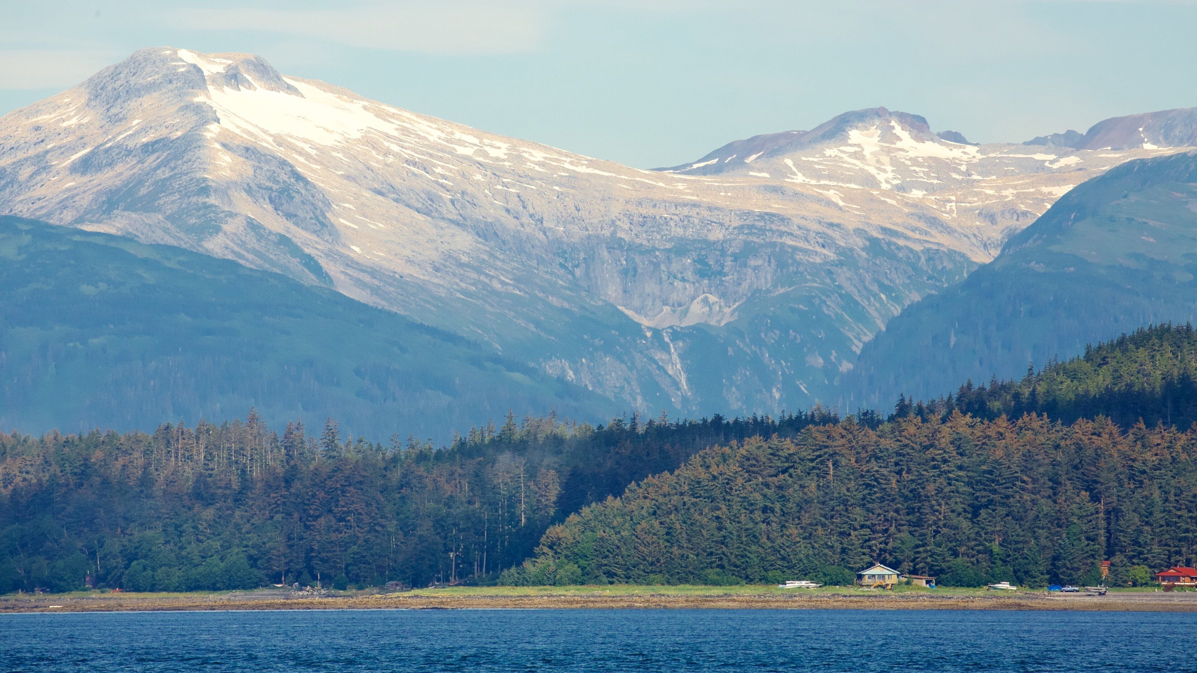 Auke Bay which includes landscape views, mountains and a lake or waterhole