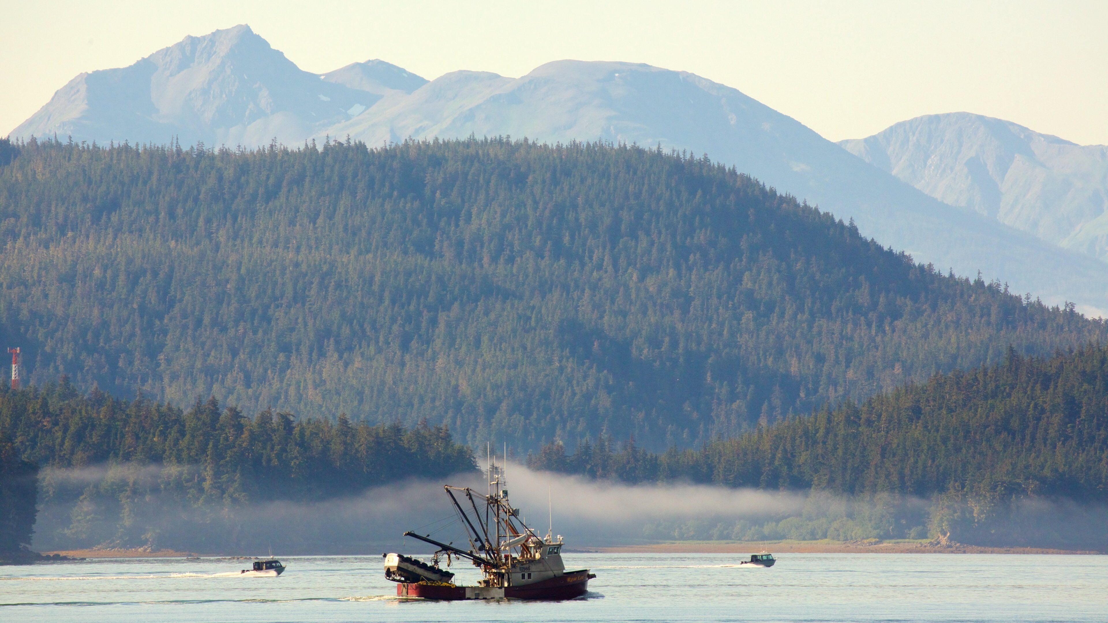 Auke Bay showing a sunset, mist or fog and general coastal views