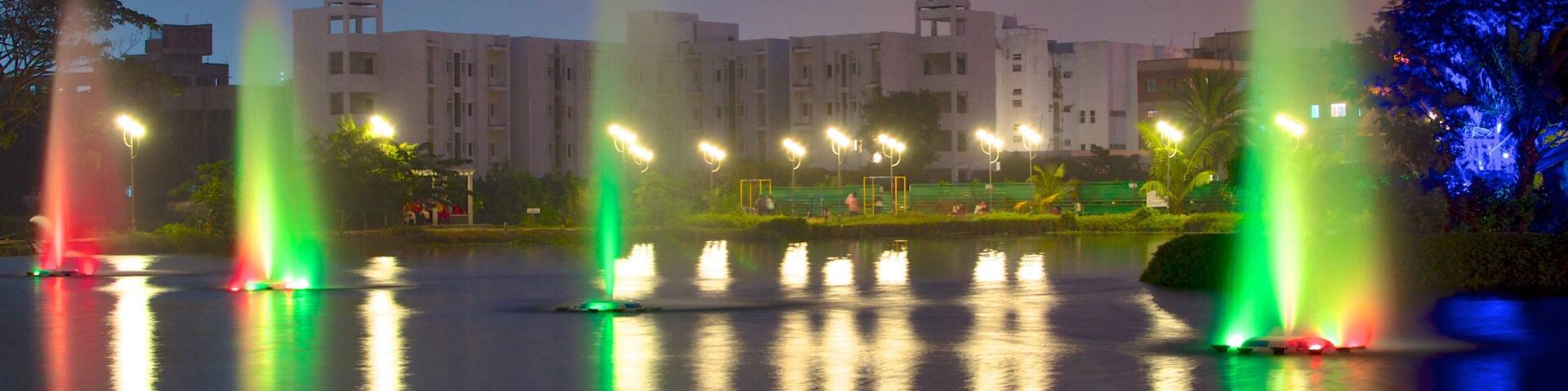 Kolkata featuring a lake or waterhole, a city and a fountain