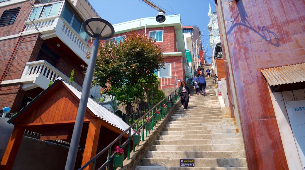 Busan showing a city as well as a small group of people