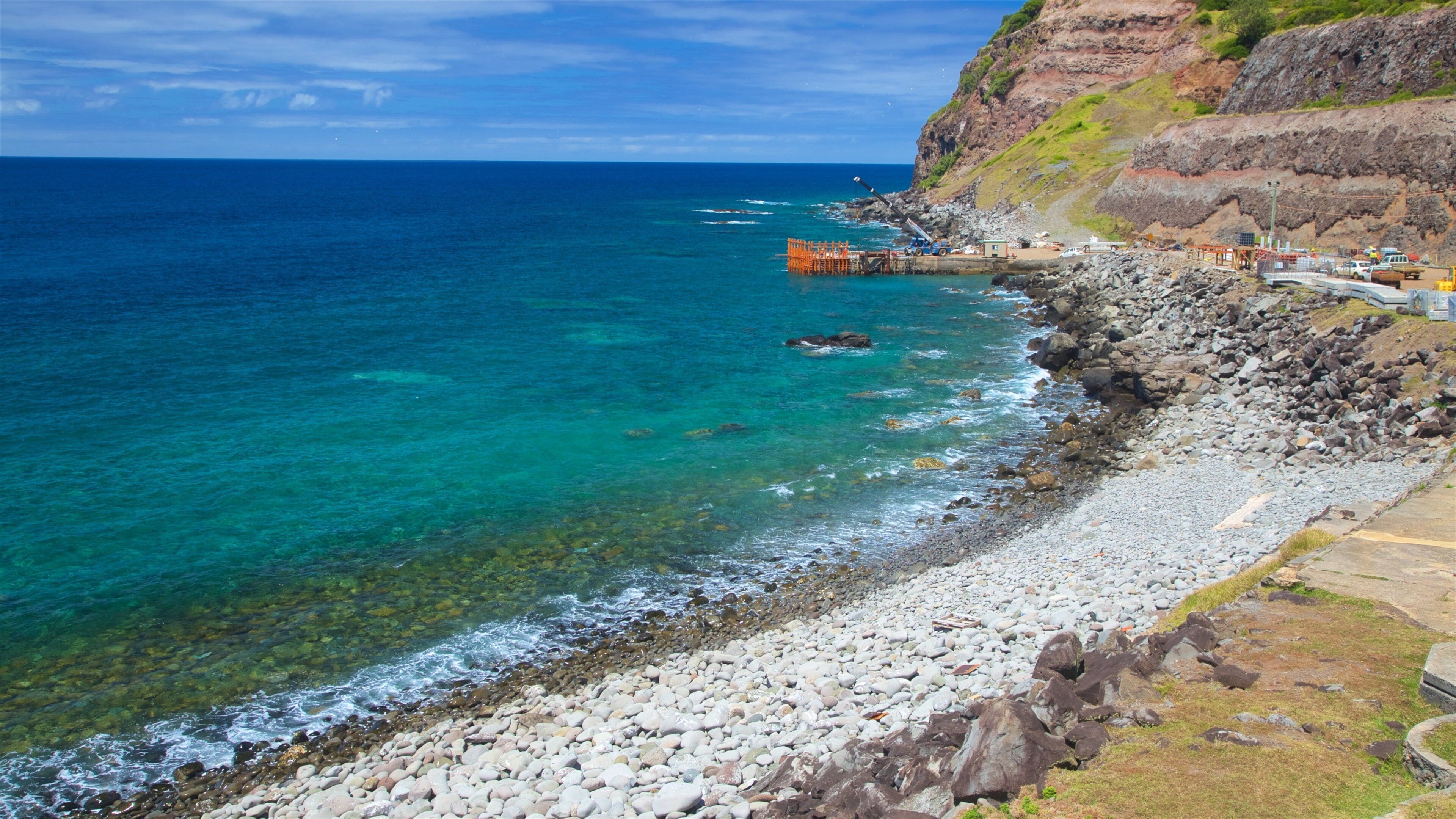 Île Norfolk montrant plage de galets, côte rocheuse et vues littorales
