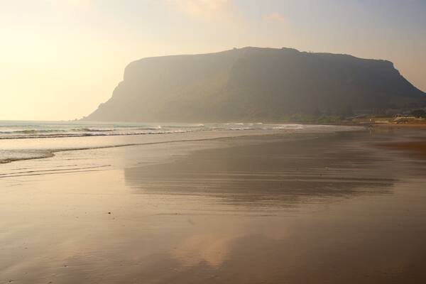 Perkins Bay featuring general coastal views, mountains and a sandy beach