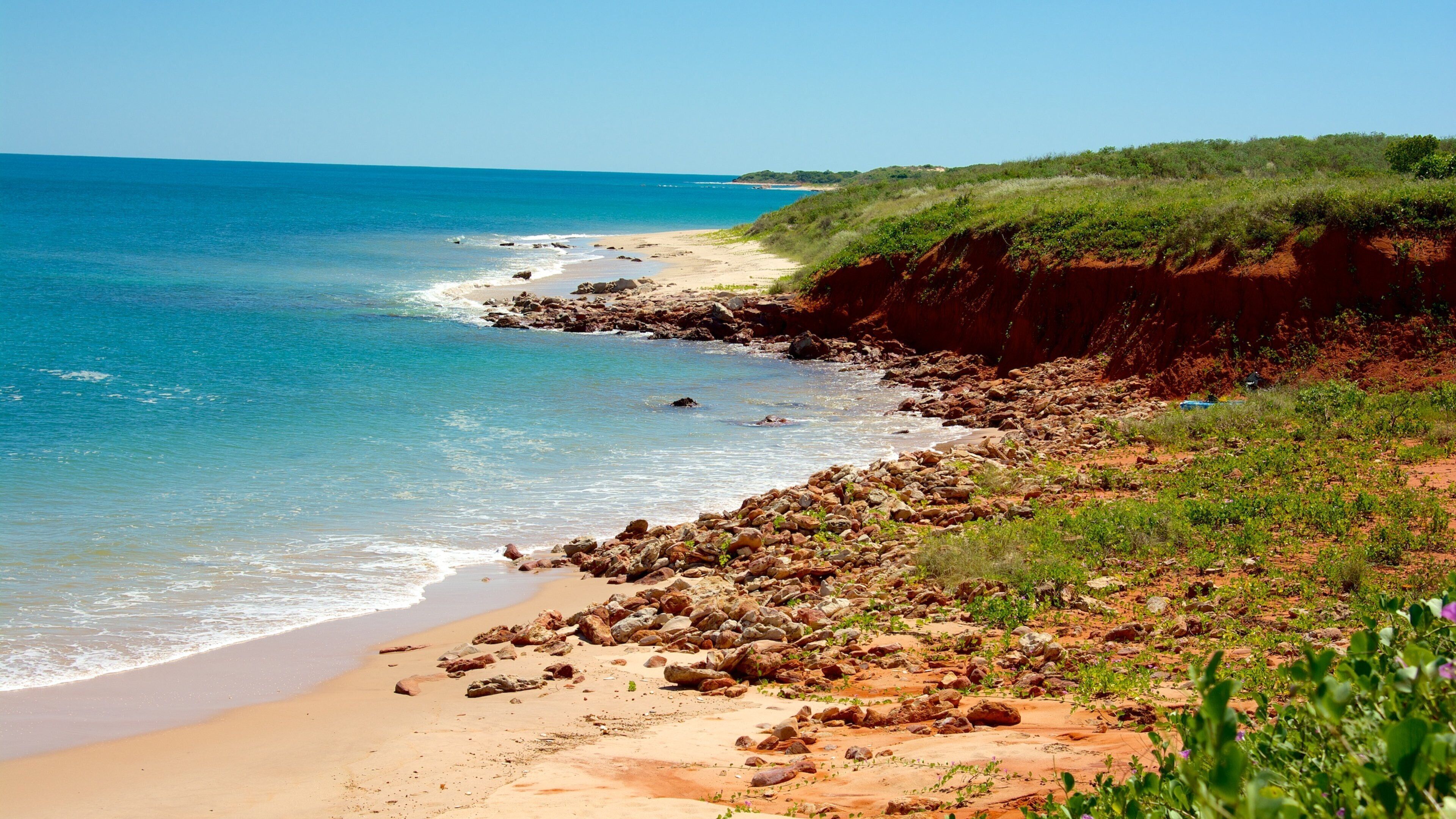 The Kimberley featuring landscape views and a sandy beach
