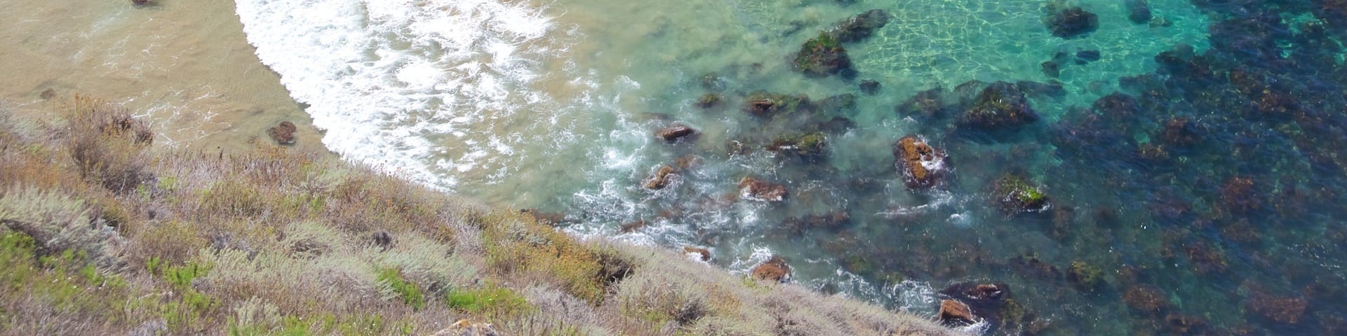 Potato Harbour featuring general coastal views and a sandy beach