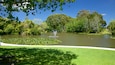 Gilmour Reserve featuring a lake or waterhole, a park and a fountain