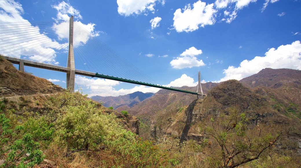 Baluarte Bridge which includes a bridge, mountains and landscape views