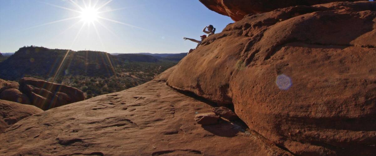 Alice Springs featuring a gorge or canyon and a sunset