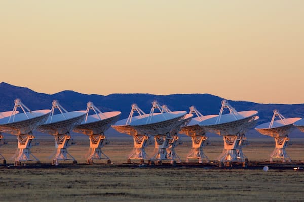 NRAO Very Large Array which includes tranquil scenes, an observatory and a sunset