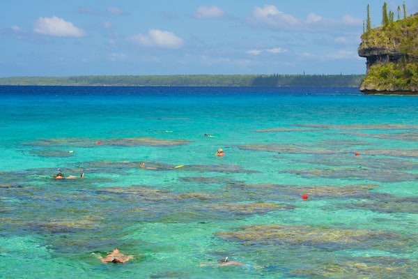 Lifou which includes tropical scenes, snorkelling and general coastal views