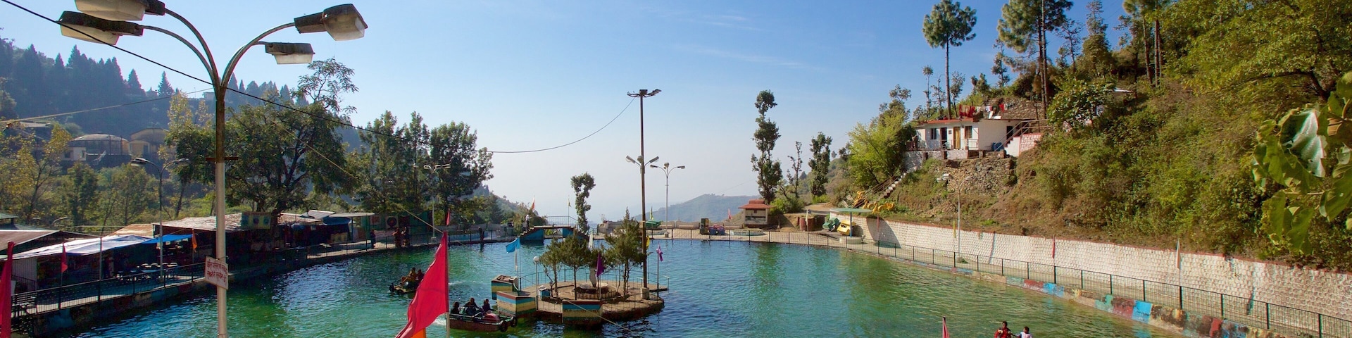 Mussoorie featuring a lake or waterhole and kayaking or canoeing
