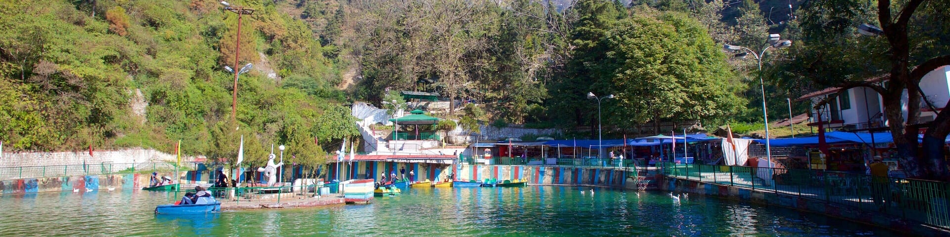 Mussoorie which includes a lake or waterhole