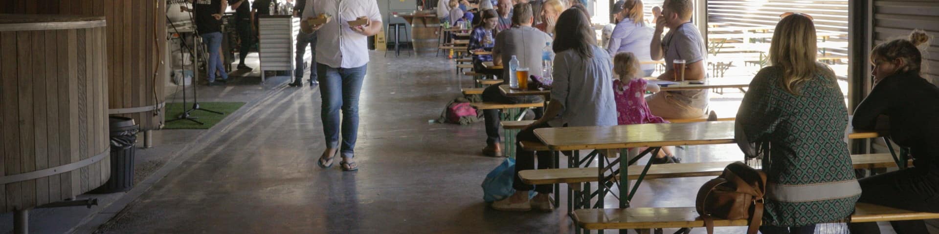 All Inn Brewing Co. which includes interior views as well as a small group of people