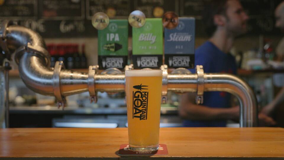 Mountain Goat Beer Brewery showing drinks or beverages and a bar