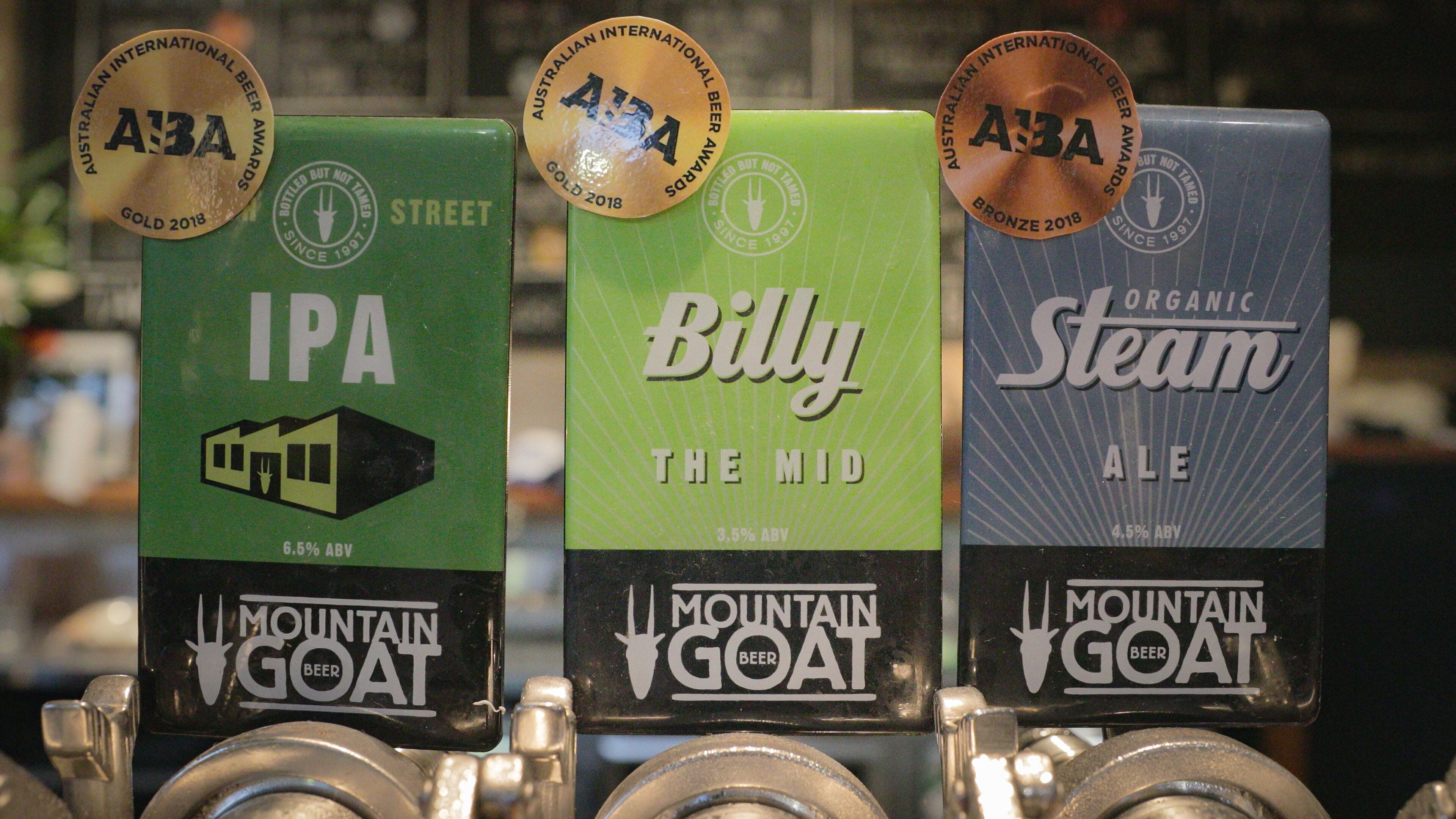 Mountain Goat Beer Brewery featuring signage and a bar