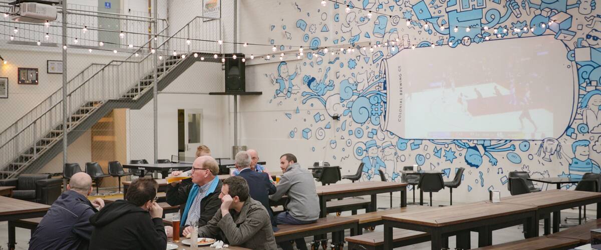 Colonial Brewing Co. showing interior views as well as a small group of people