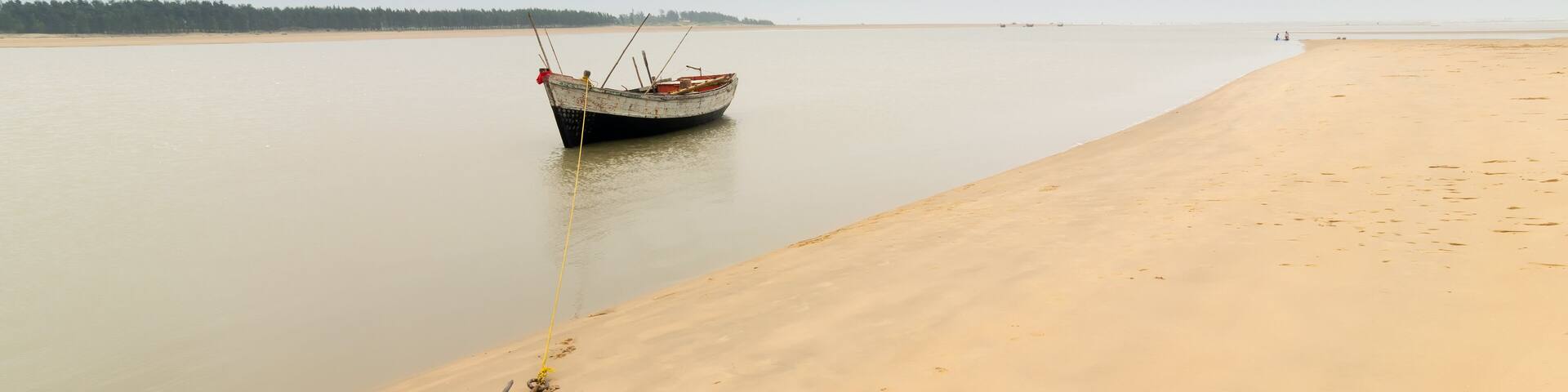 Boat and river at Tajpur, West Bengal, India