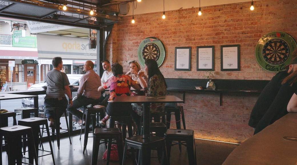 The Catchment Brewing Co. featuring interior views and a bar as well as a small group of people