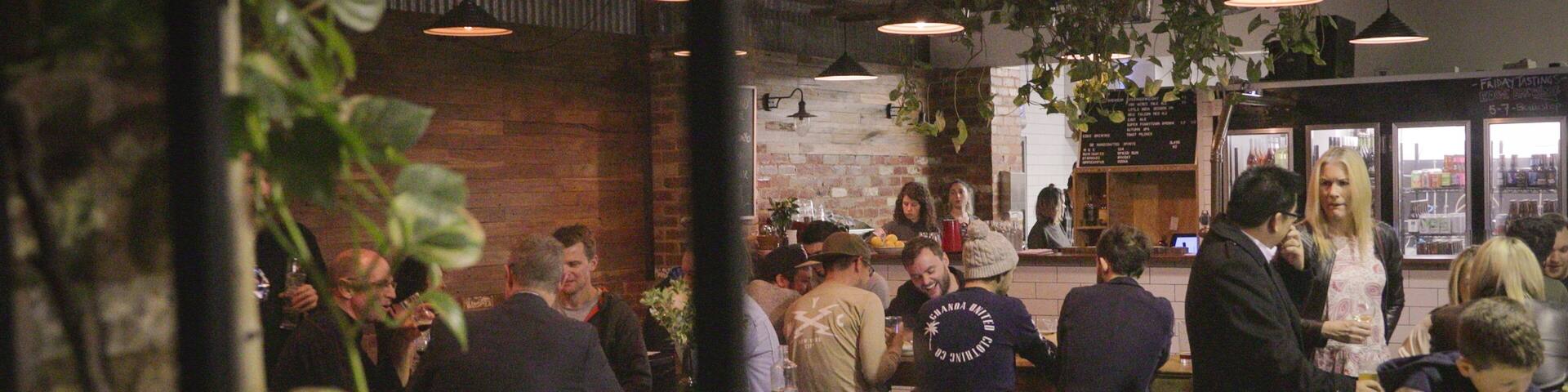 The Public Brewery which includes a bar, interior views and nightlife