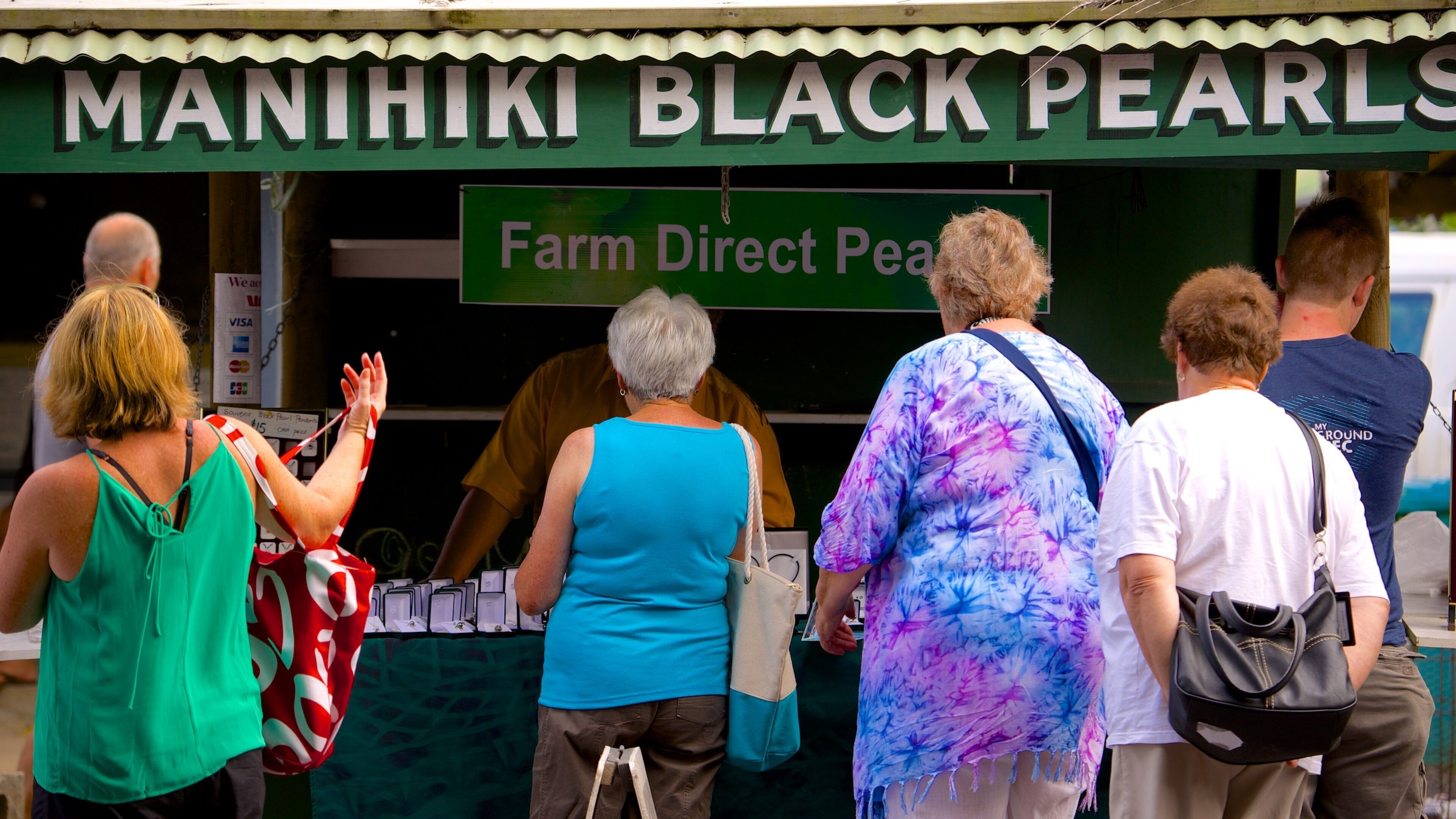 Rarotonga which includes markets as well as a small group of people