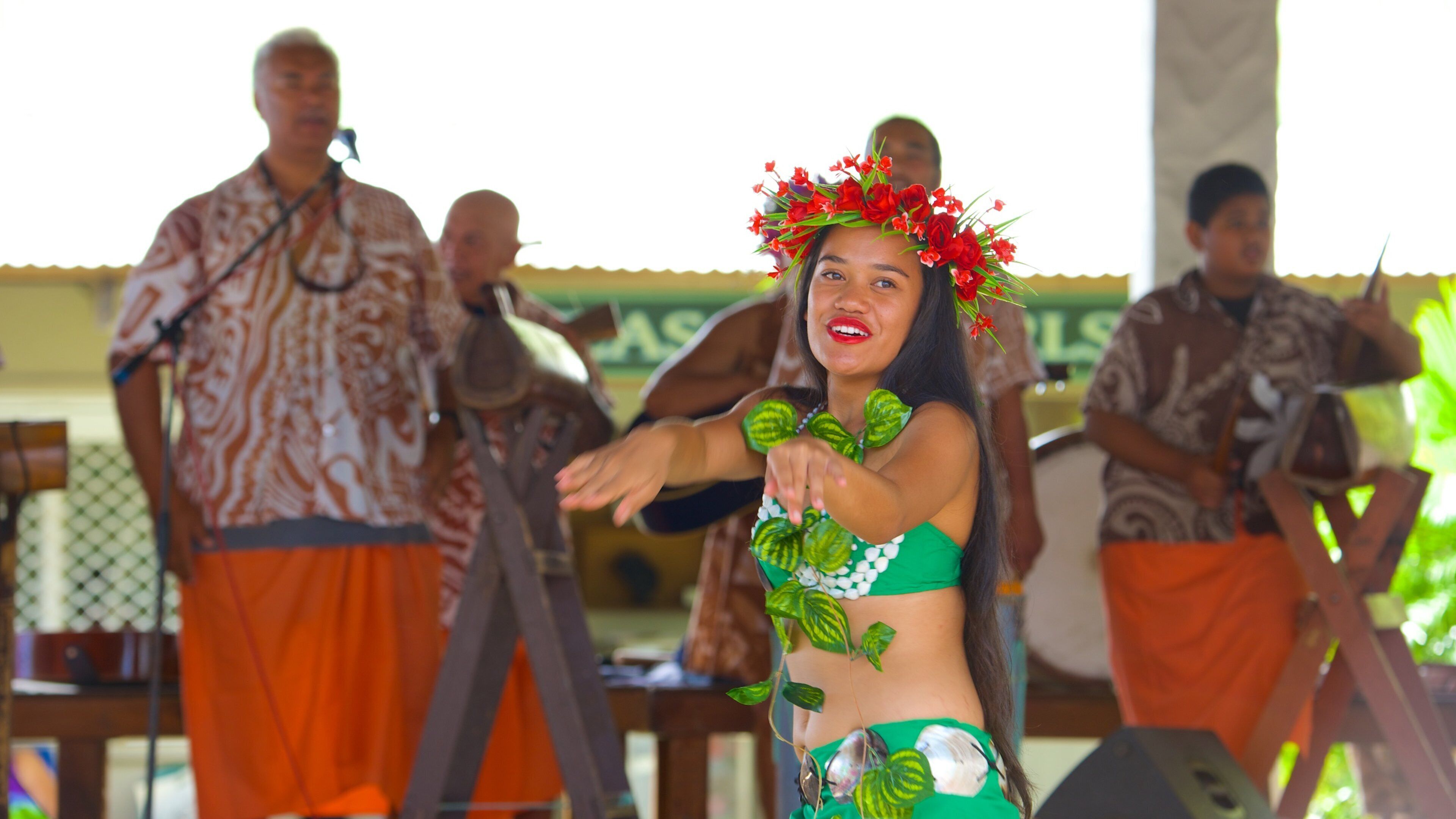 Rarotonga featuring street performance as well as an individual femail