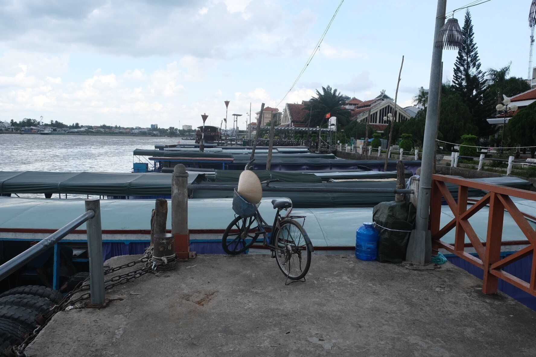 The lonely bike at the end of the pier. Waiting patiently for a ride. 