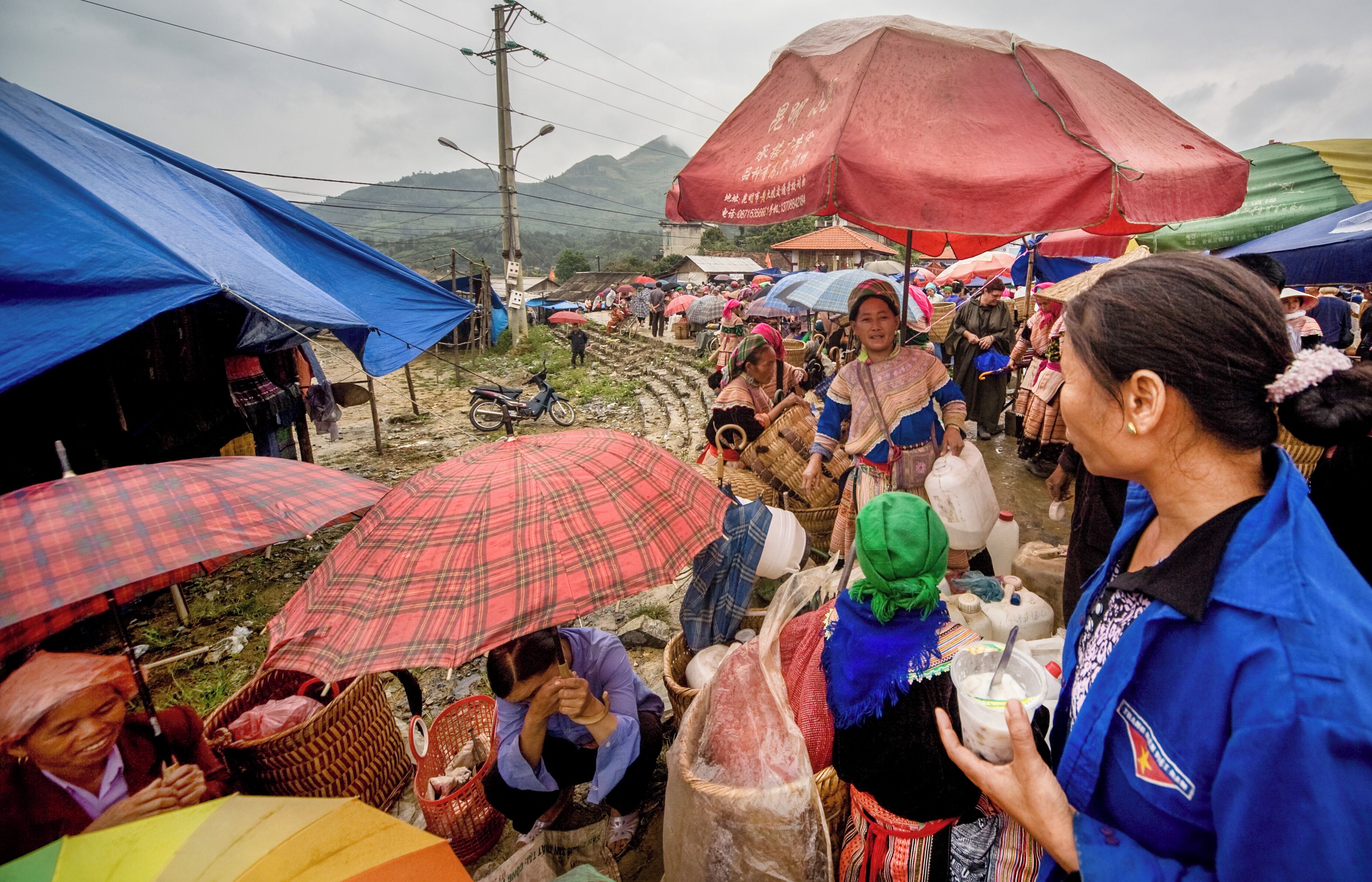 #LikeALocal,  #Adventure

Bac Ha market in the North of Vietnam.
Held every Sunday, a frenetic,buzzing social event,where the various hill tribes descend,"in particular the Flower Hmong" ,to trade,drink,eat and generally make merry.Rice or Corn wine in Jerrycans,
Sữa Chua Yaourt (Vietnamese Yogurt), delicious.