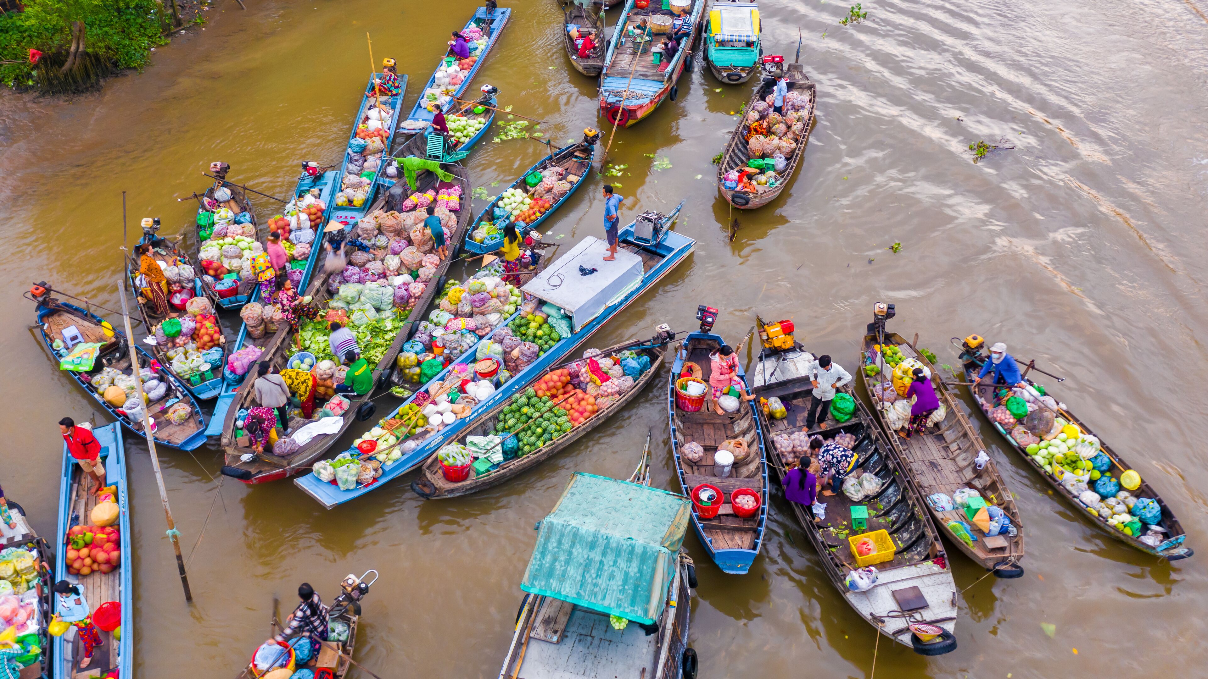 Aerial view from above Phong Dien floating market on Tet holiday full of fruit and agricultural products